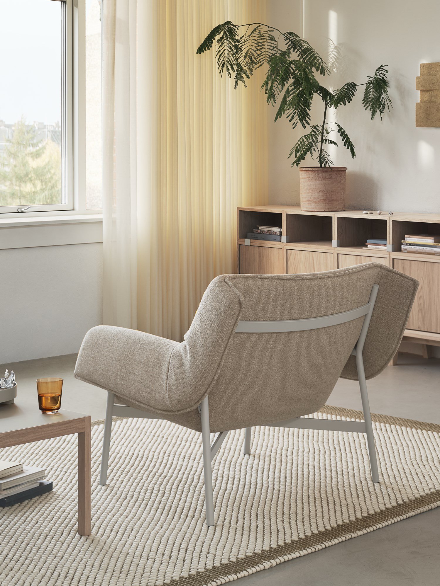 Wrap Lounge Chair in Ecriture 240/Grey, Workshop Coffee Table in Warm Grey Linoleum/Oak, Raise Glass in Burnt Orange, Pebble Rug in Brown Green 170x240 cm, Stacked Storage System in Oak Wrap Lounge Chair in Ecriture 240/Grey, Workshop Coffee Table in Warm Grey Linoleum/Oak, Raise Glass in Burnt Orange, Pebble Rug in Brown Green 170x240 cm, Stacked Storage System in Oak